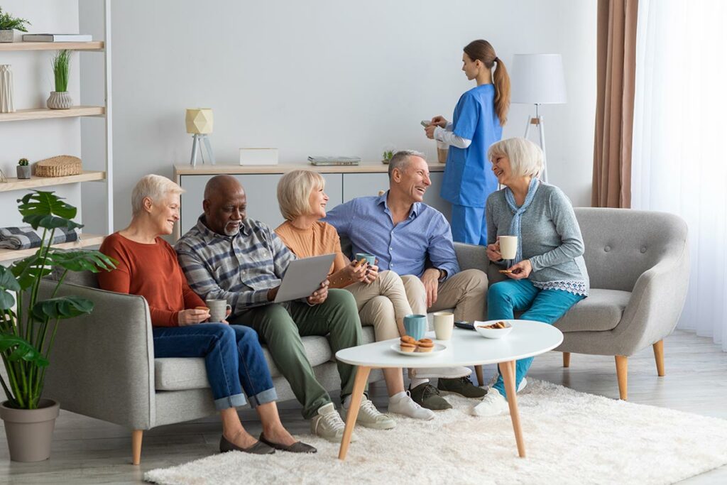 Proveer at Grayson Valley | Group of seniors enjoying coffee on couch
